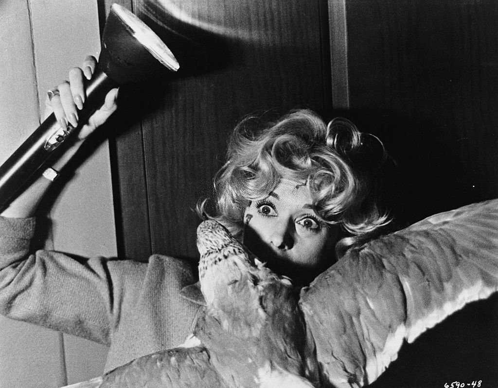 Melanie Daniels (Tippi Hedren) fights off an attacking gull in ‘The Birds’, 1963