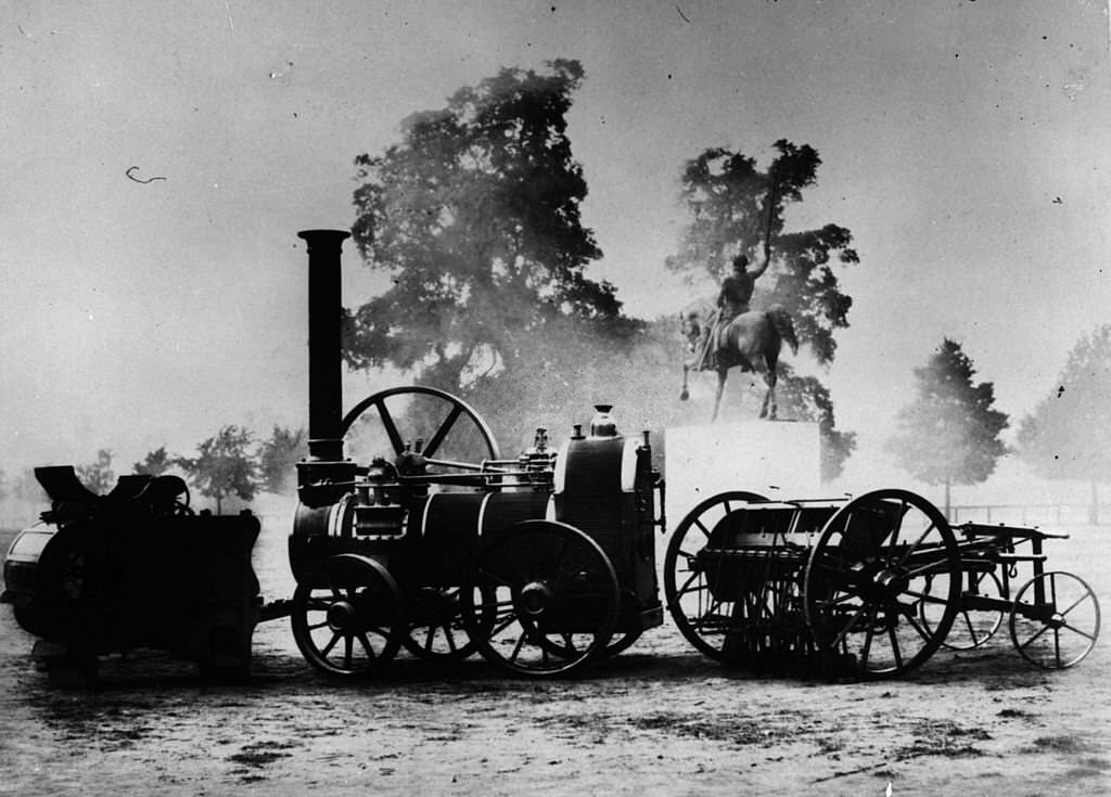 #14 A display of a portable steam engine corn threshing machine and a seed drill on show at the Great Exhibition, Crystal Palace, Hyde Park in London.