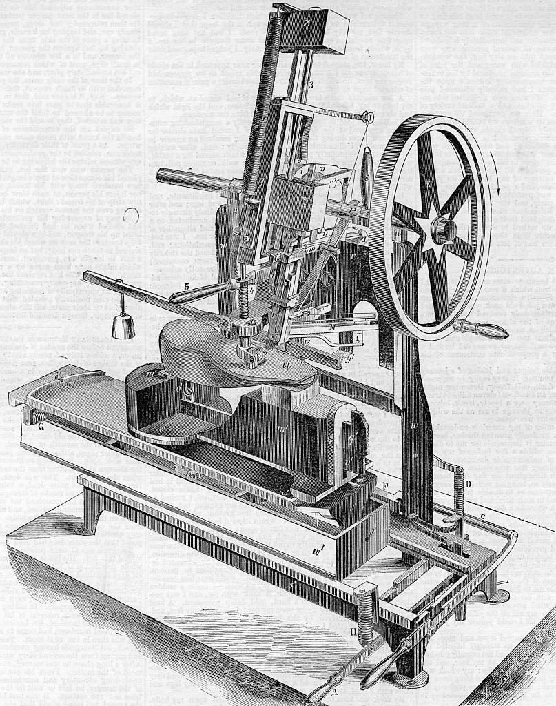 #28 Engraved illustration of a Boot And Shoe Pegging Machine, at the Crystal Palace, a cast-iron and plate-glass structure originally built in Hyde Park, London, England, to house the Great Exhibition, 1851.