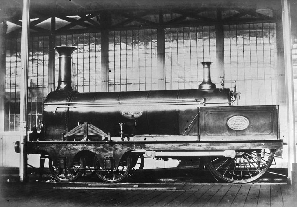 #55 The South Eastern Railway Company’s express train ‘Folkstone’ designed by T R Crampton on display at the 1851 Great Exhibition in the Crystal Palace, London.