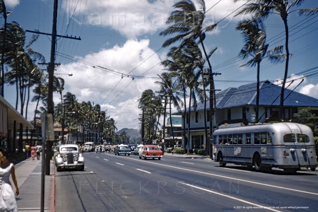 #90 View along Waikiki’s Kalakaua Avenue from between Lewers Road and Royal Hawaiian Avenue, 1950s