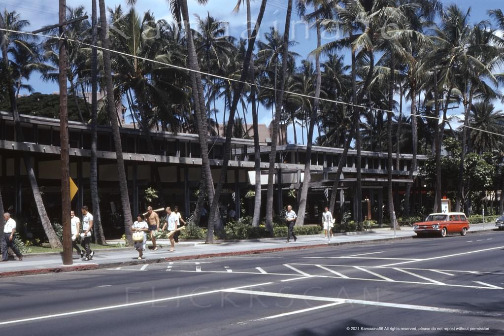 #51 The Royal Hawaiian Shopping Arcade on Kalakaua Avenue across from Liberty House department store and the Waikiki Theater, 1962