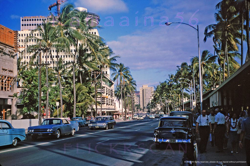 #63 Late afternoon light looking east along Waikiki’s Kalakaua Avenue from near the Lewers Street intersection, 1965