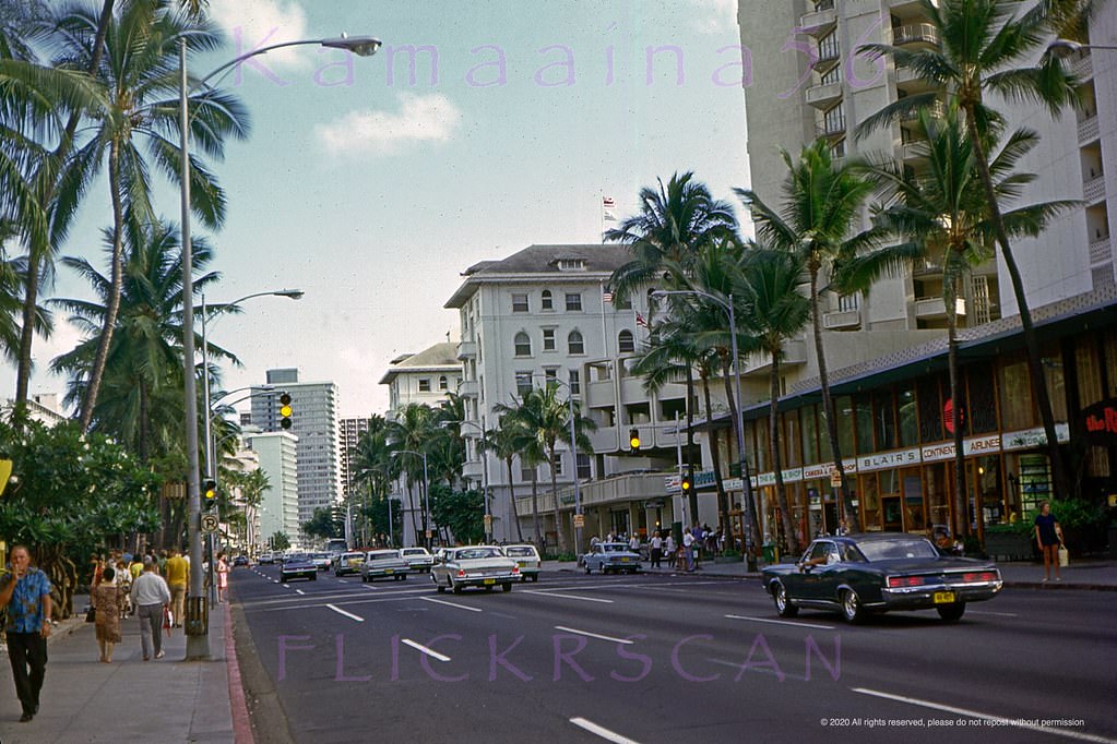 #14 East along Waikiki’s Kalakaua Avenue shortly after its conversion to one way Diamond Head with no more on-street parking, 1971