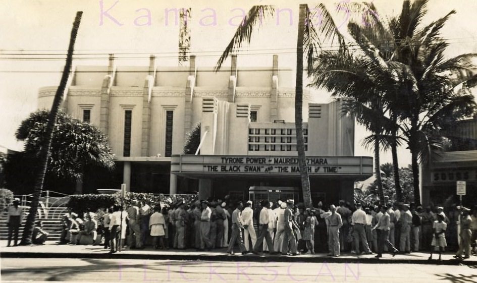 #20 Quite a crowd of uniformed servcemen and a few civilians showed up at the Waikiki Theater on Kalakaua Avenue, 1943