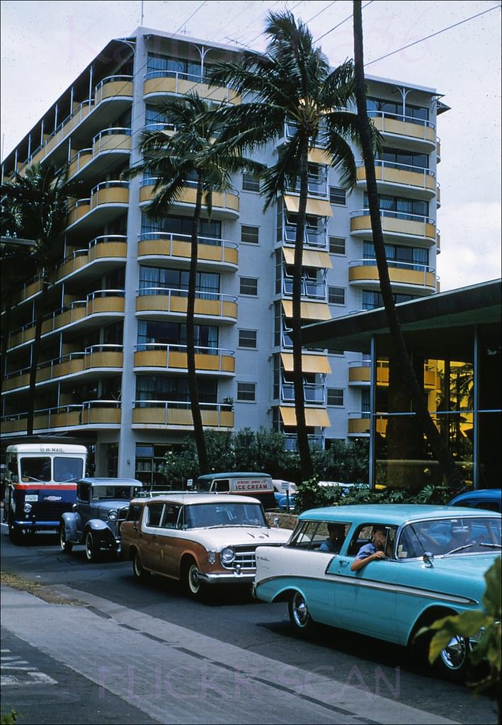 #140 Looking makai down Lewers Road in Waikiki. The building on the right is the Bishop Bank Waikiki, 1957