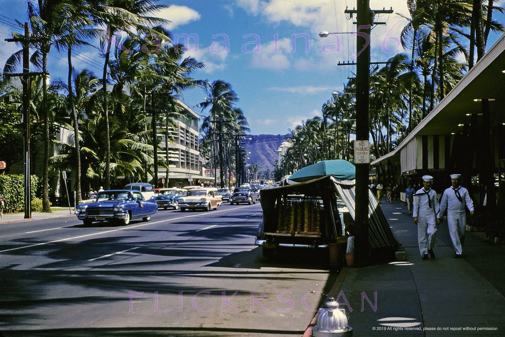 #107 Looking Diamond Head along Kalakaua Avenue from the Lewers Street intersection, 1960