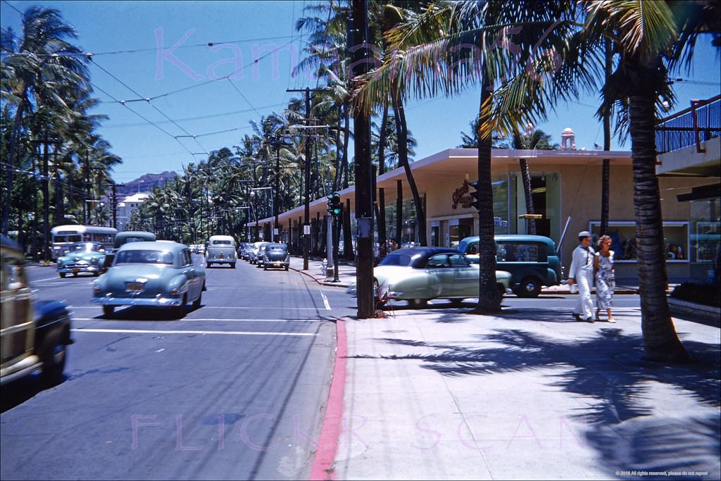 #145 Looking Diamond Head (more or less east here) along Waikiki’s Kalakaua Avenue from the corner of Lewers Street, 1952