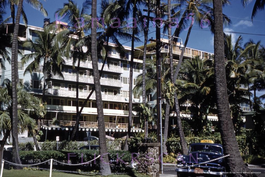 #159 Hotelier Roy Kelley’s Edgewater Hotel looking across Kalia Road from the driveway of the Halekulani Hotel, 1958