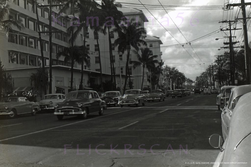 #30 View along Waikiki’s Kalakaua Avenue from near the Kaiulani Avenue intersection, 1950s