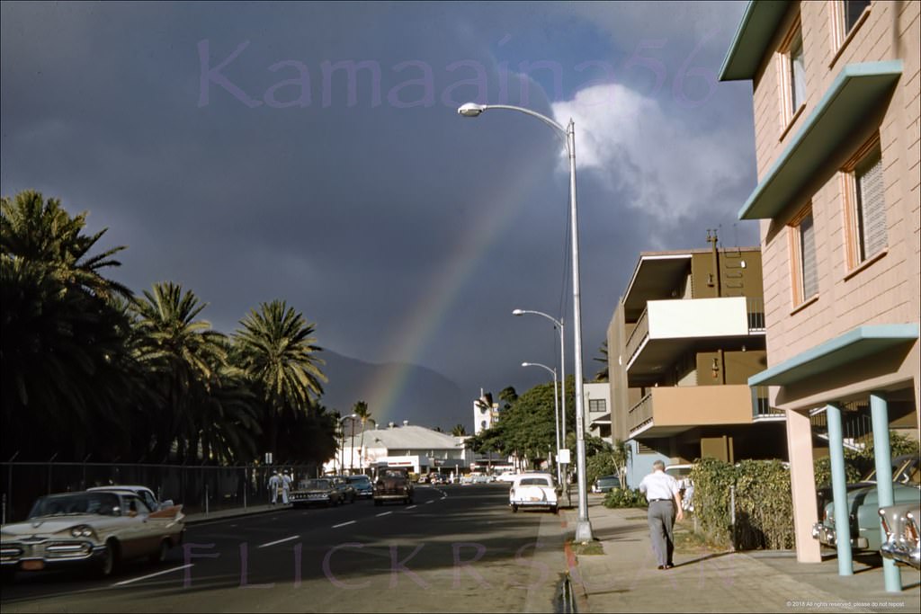 #116 Street level view looking inland along Waikiki’s Saratoga Road across from Fort DeRussy, 1960