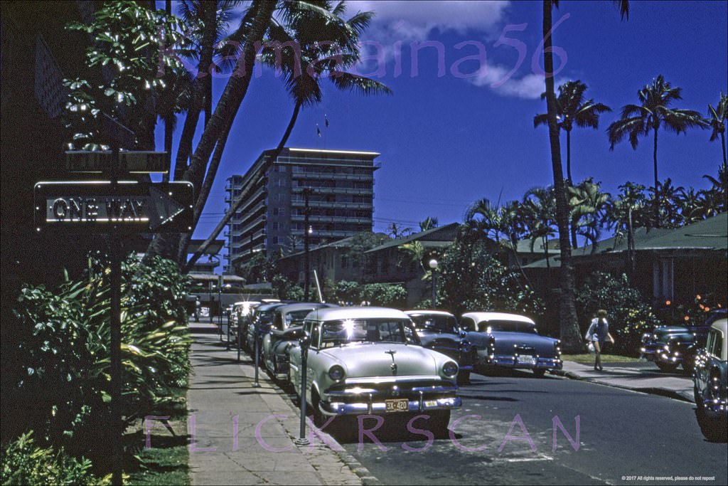 #179 A rather underexposed but interesting view looking south towards the ocean along Waikiki’s Beachwalk from the intersection with Helumoa Road when it used to go through from Lewers, 1957