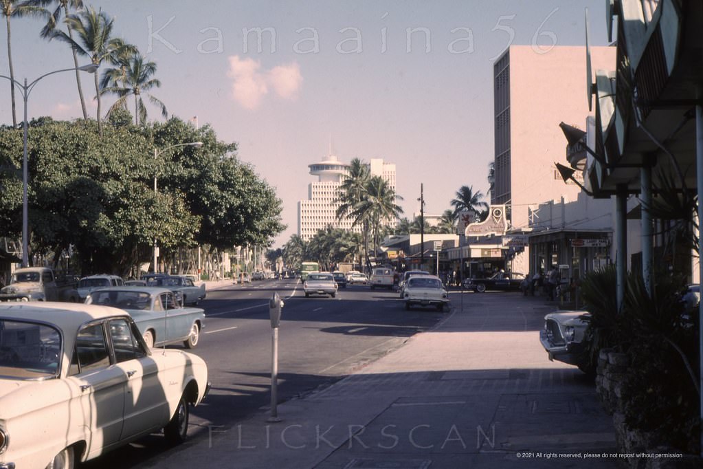 #133 The view here is more or less northwest along Waikiki’s Kalakaua Avenue from between Uluniu and Liliuokalani Avenues, 1965
