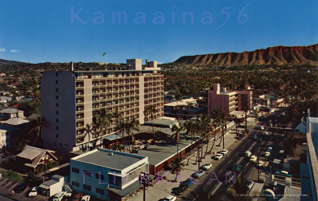 #191 Mauka (inland) side of Kalakaua Avenue between Kaiulani and Uluniu Avenues across from the Waikiki Beach Center, 1950s.