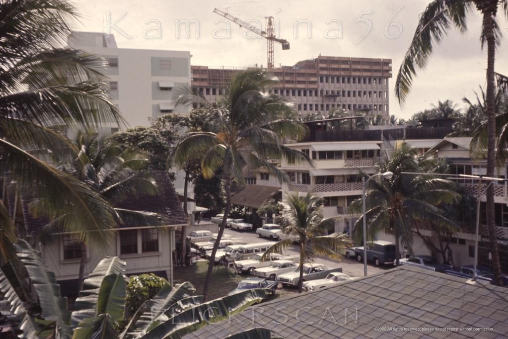 #142 Unusual angle on the four story Comstock Apartment Hotel (center) on Waikiki’s Lauula Avenue between Royal Hawaiian and Seaside Avenues, 1964.