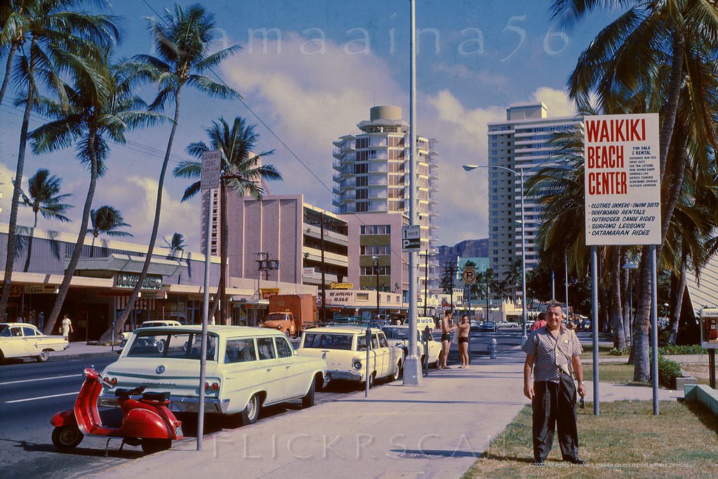 #170 Diamond Head along Kalakaua Avenue from the Waikiki Beach Center across from the entrance to the Waikiki Biltmore, 1964.