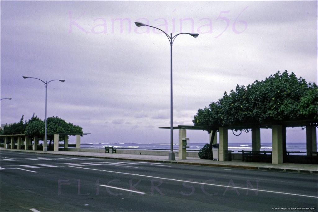 #144 Early morning looking more or less east along Waikiki’s Kalakaua Avenue near the intersection with Kealohilani Avenue, 1967
