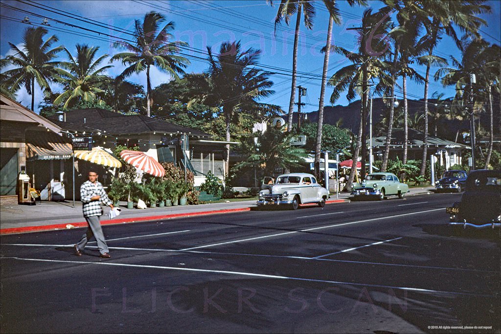 #230 Looking Diamond Head along Waikiki’s Kalakaua Avenue from the Liliuokalani Avenue intersection, 1951