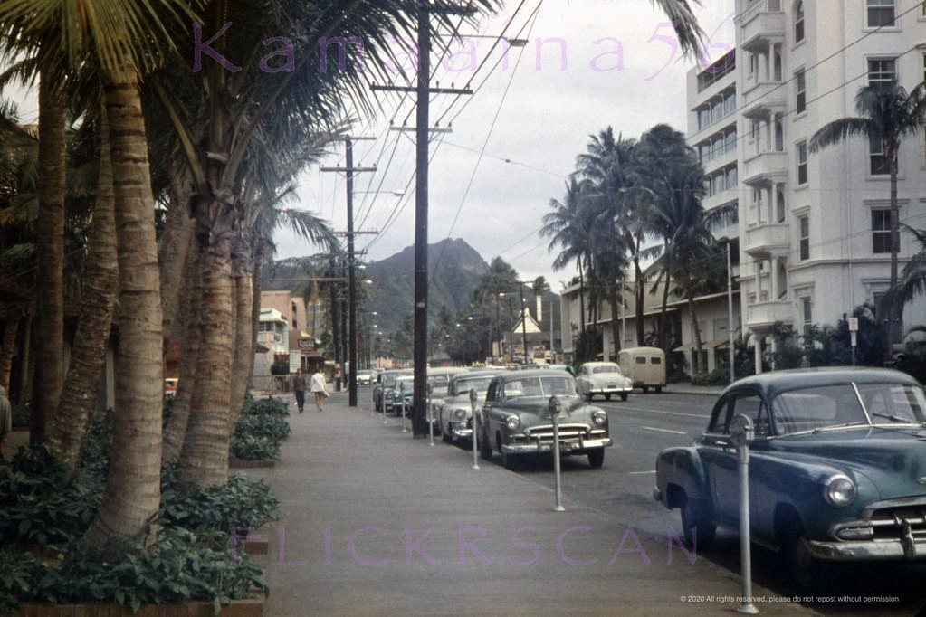 #36 Waikiki street scene taken during the filming of the 1956 Jane Russell/Richard Egan WWII drama “The Revolt of Mamie Stover.”, 1956