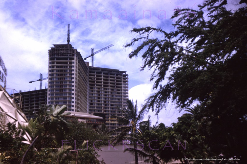 #193 Waikiki’s landmark 26 floor Ilikai Hotel under construction viewed from the neighboring Hilton Hawaiian Village Hotel looking makai (towards the ocean), 1963