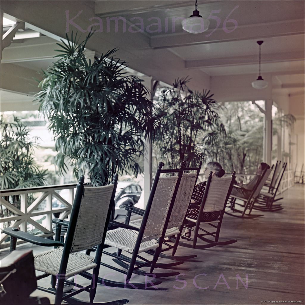 #39 Old rocking chairs line the front porch of the Moana Hotel looking out on Waikiki’s Kalakaua Avenue, 1950s