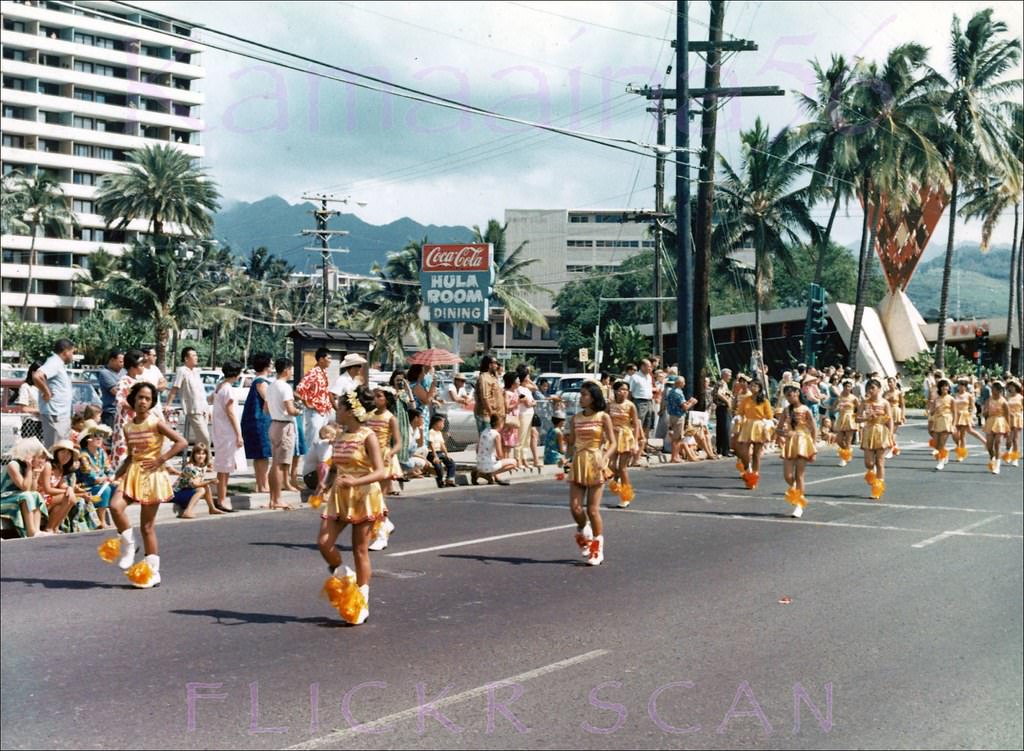 #203 Parade on Ala Moana Blvd. at John Ena Road with Tops Coffee Shop in the background, 1960s