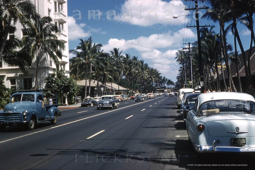 #21 Looking Ewa (more or less west here) along Waikiki’s Kalakaua avenue from the intersection with Kaiulani Avenue, 1962