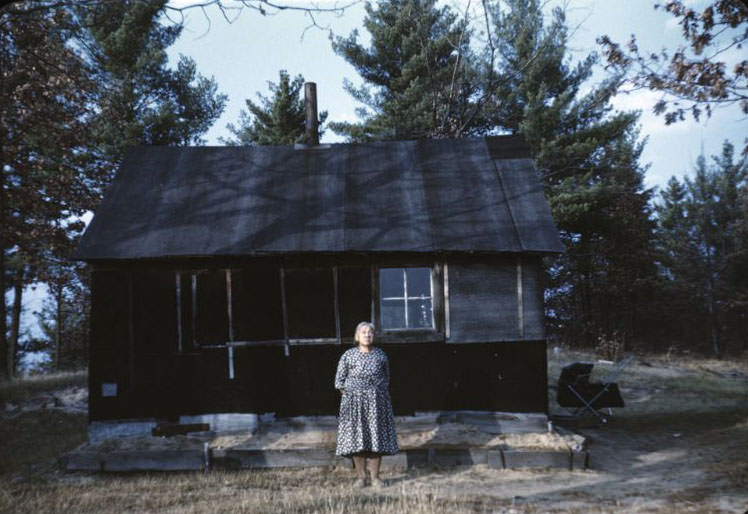 #37 Nellie Wolf by house, Bethany Indian Mission, Wittenberg, Wisconsin, 1953