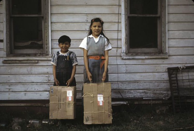 #44 Tony and Martha Whitewing with packages, Bethany Indian Mission, Wittenberg, Wisconsin, 1953
