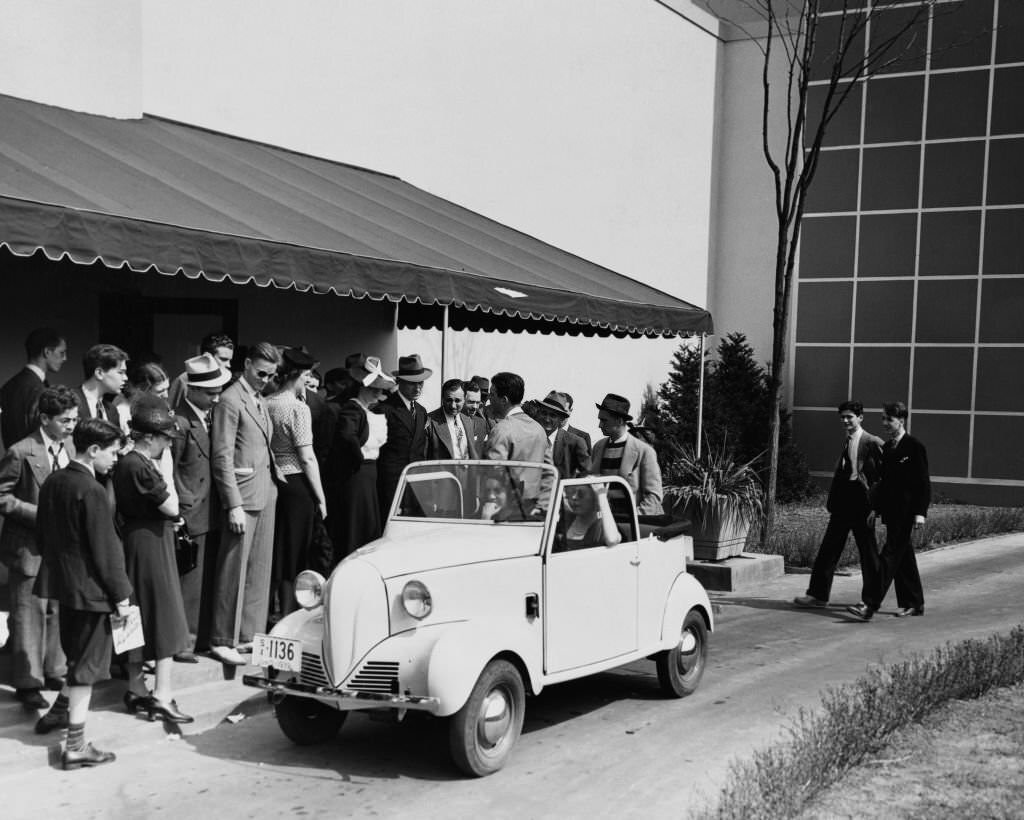 #103 The four-person Crosley small car at the 1939 New York World’s Fair.. It has two cylinders, goes 50 miles on a gallon of gas and costs $350.