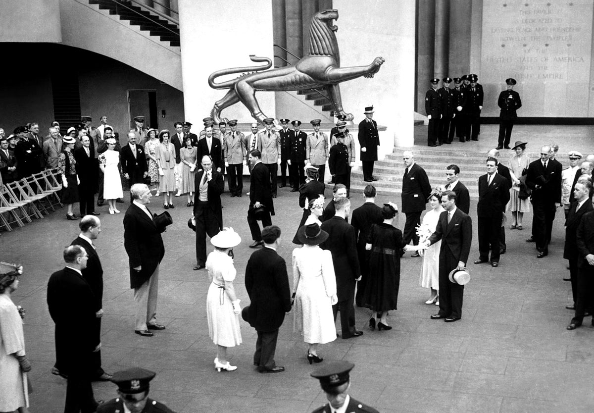 #18 Presentations are made to Britain’s King George VI and Queen Elizabeth in the British Pavilion, during their visit to the fair in New York, on June 19, 1939.