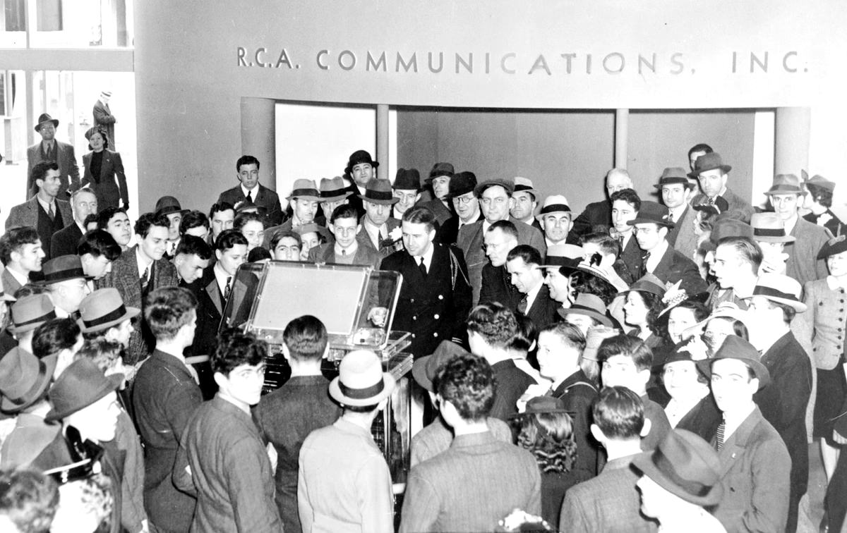 #36 Crowds surround a new television in the RCA exhibit at the 1939 World’s Fair.