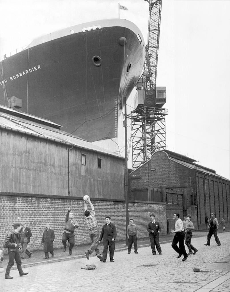 #96 The British Bombadier Cargo ship towering over the surrounding warehouses at Clyde Dockyard, Glasgow, 1962