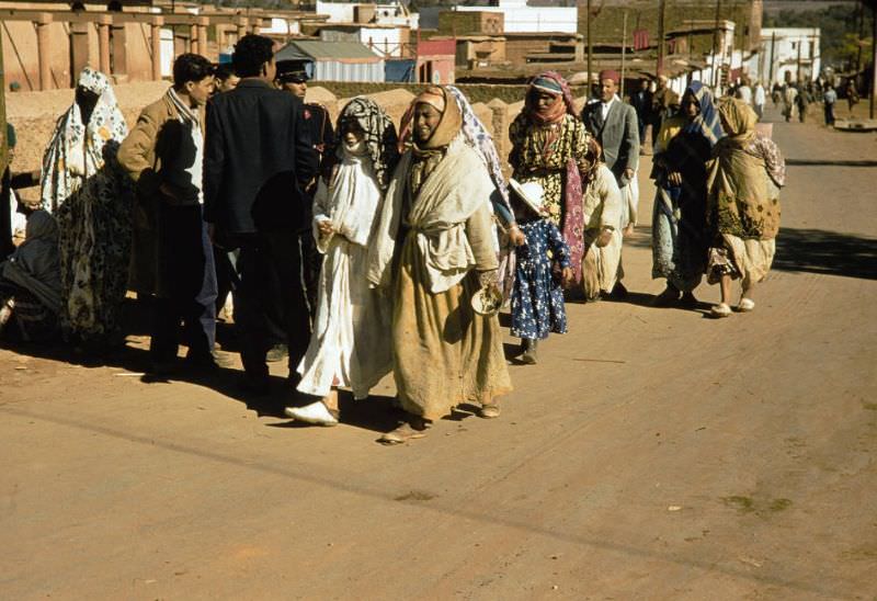 #96 Berber people walking through town, 1960s