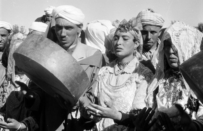 #108 Berber musicians playing instruments in Atlas Mountains, 1960s