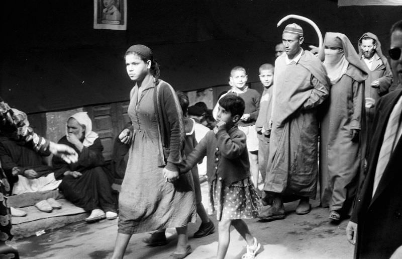 #72 People walking through Jewish Quarter in Marrakech, 1960s