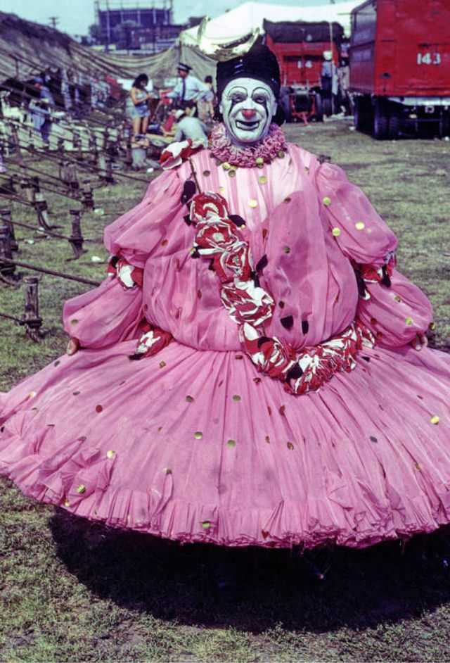 #12 Louis Nagy, a clown in pink Circus Serenade wardrobe.