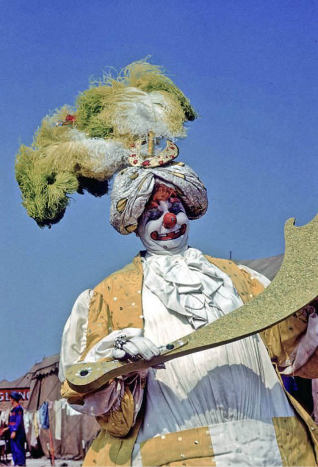 #14 Felix Adler, a clown in spec wardrobe.