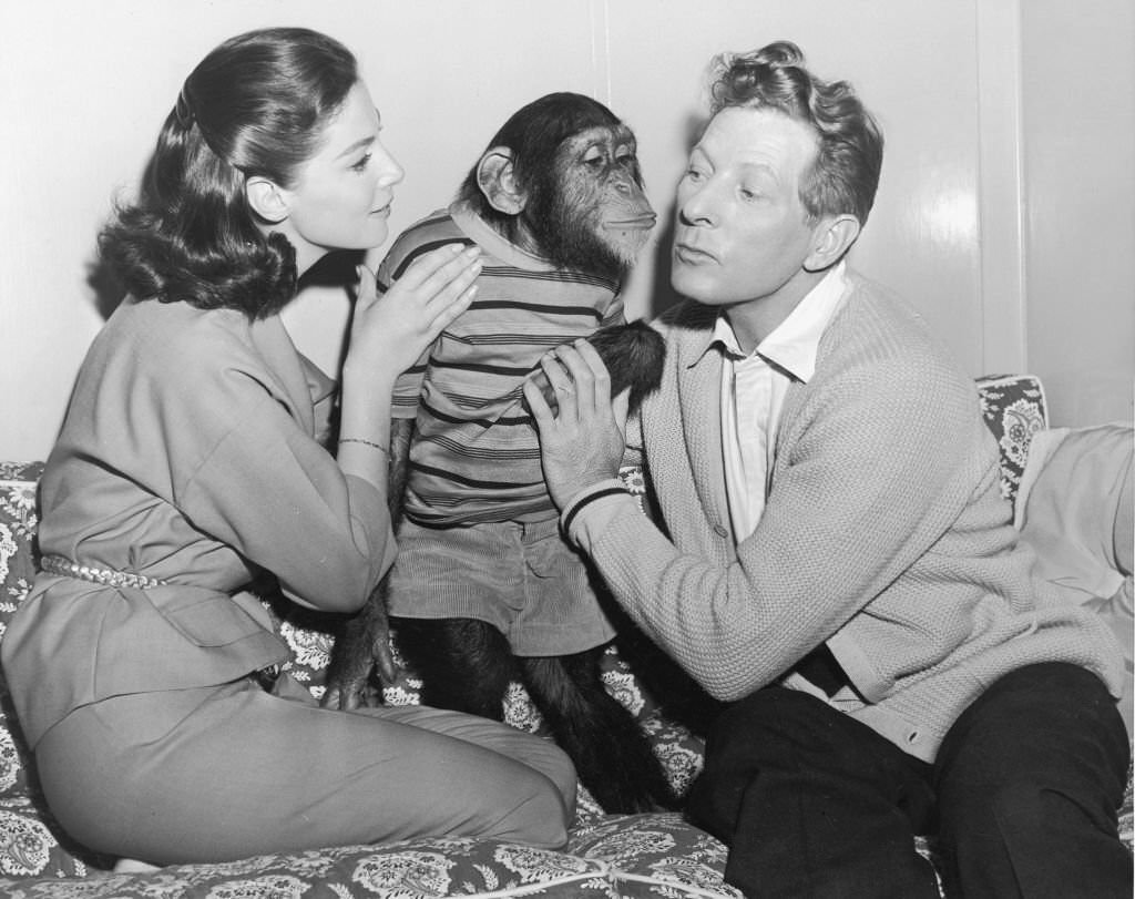 #15 Danny Kaye and actor Pier Angeli with chimp