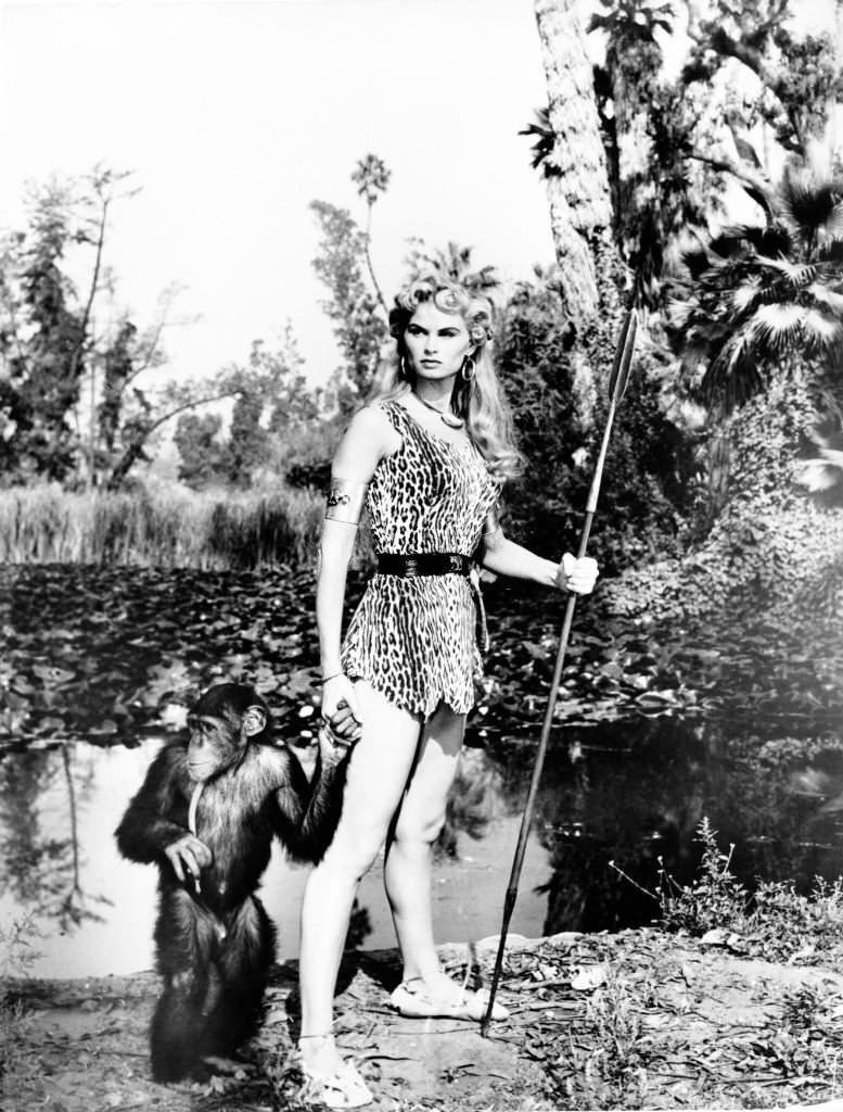 #16 Irish McCalla with chimp, 1955