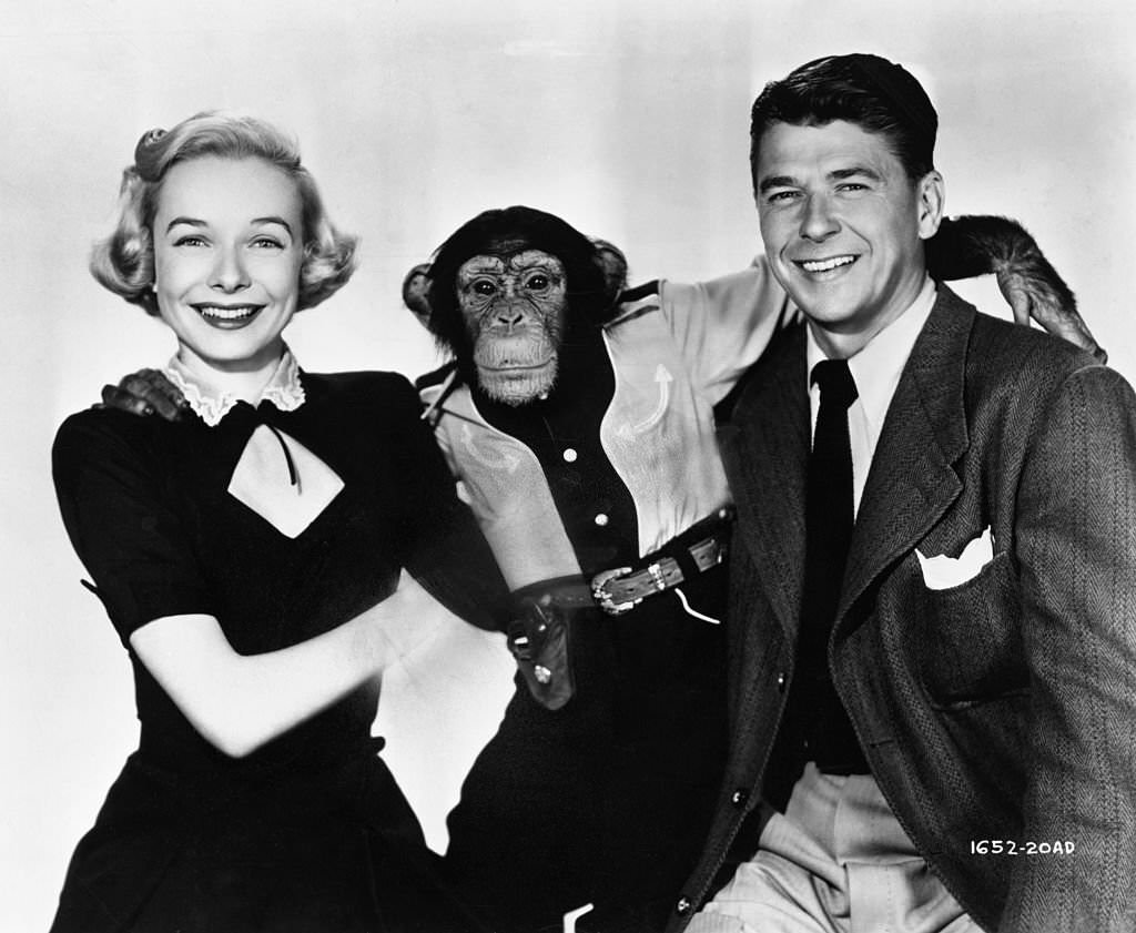 #22 Diana Lynn and Ronald Reagan with chmip, 1959