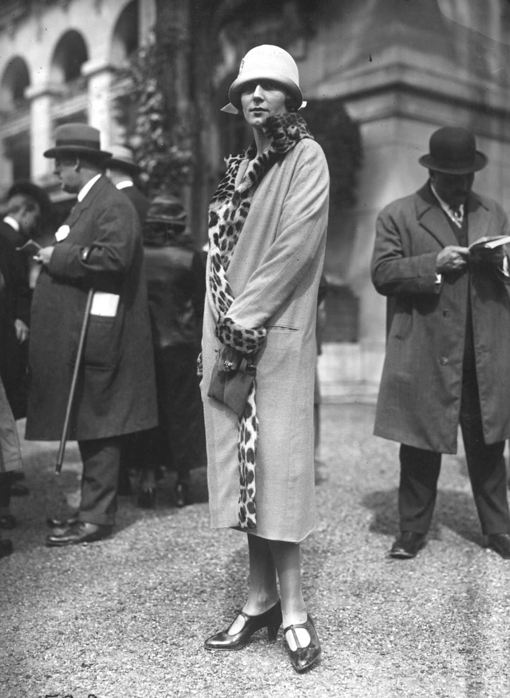 #107 A simple wrapover coat with leopard skin trim, 1925