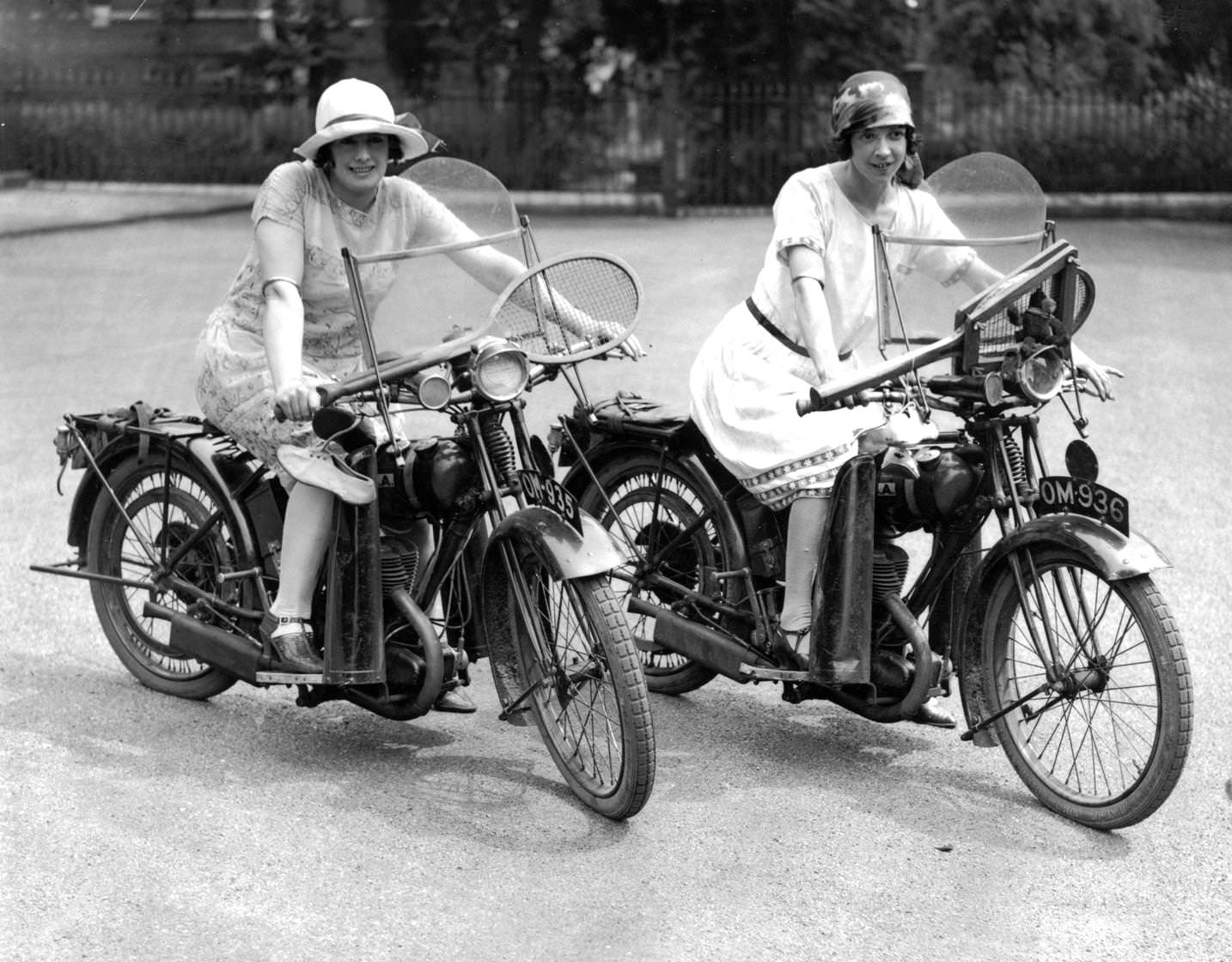 #171 Two motorcycling tennis players, 1925