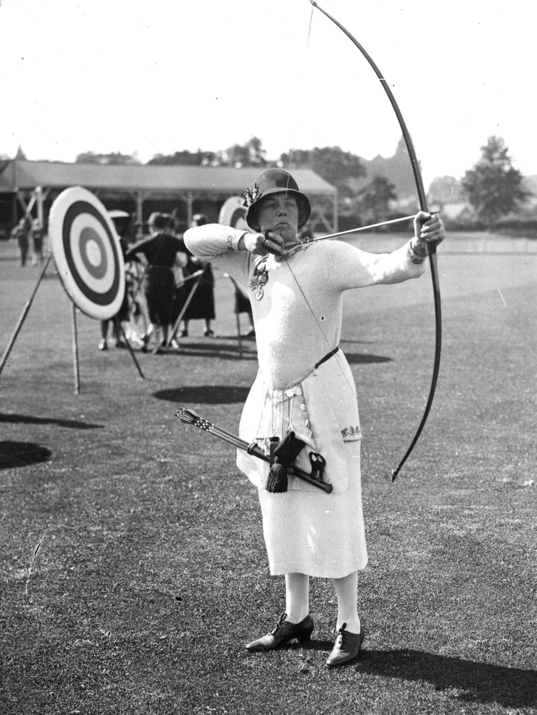 #28 Miss V M Rushton pulls a bow at the Tunbridge Wells Archery Contest in Kent, 1920