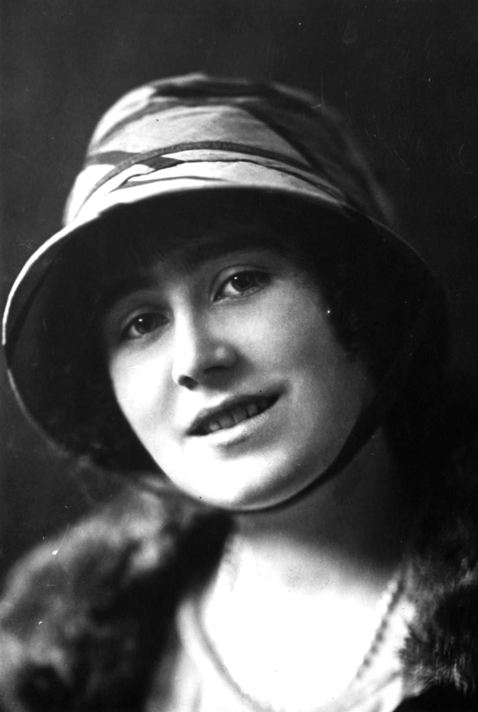 #29 Future Queen Consort to King George VI, Lady Elizabeth Bowes Lyon in cloche hat, 1920