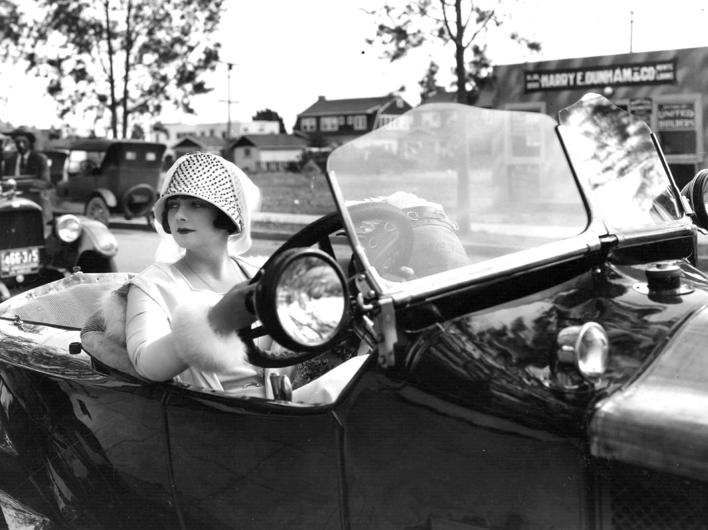 #64 American silent star Alice Terry , the screen name of Alice Taafe, drives to the studio where she will be working on the MGM film ‘The Great Divide’, 1924