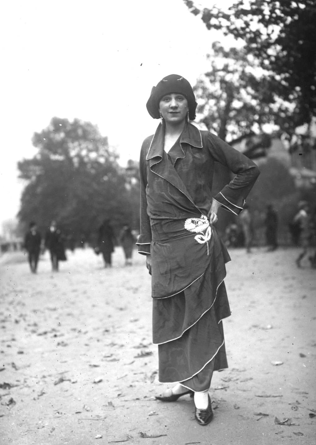 #67 Tiered ankle length dress in watered silk, with an embroidered rose at the hip, 1923