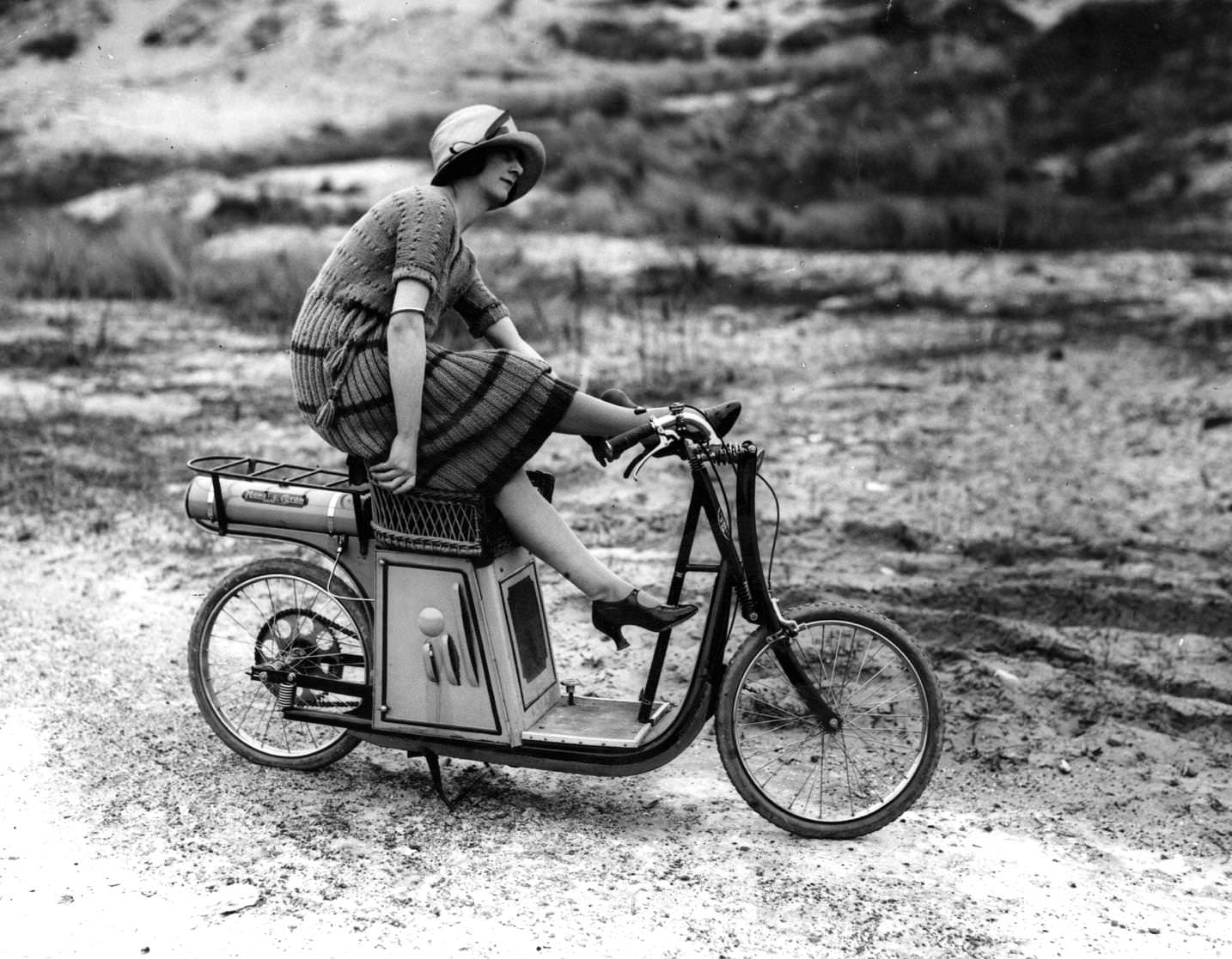 #13 Gladys Ross on a scooter at Le Touquet, France, 1921