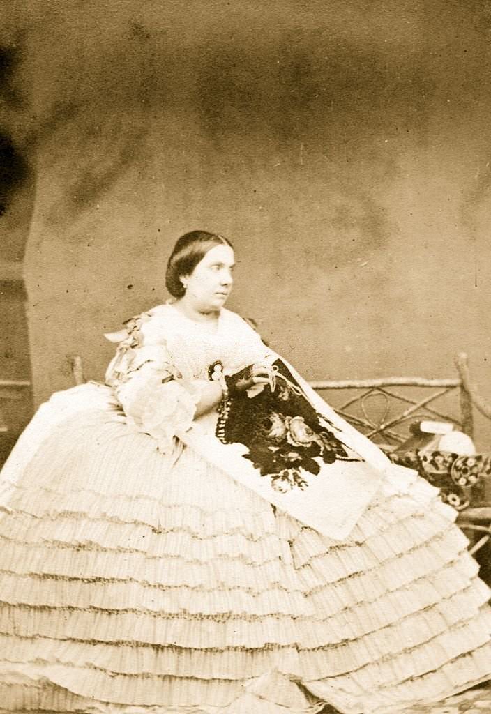 #29 Isabella II, Queen of Spain, embroidering a shawl.