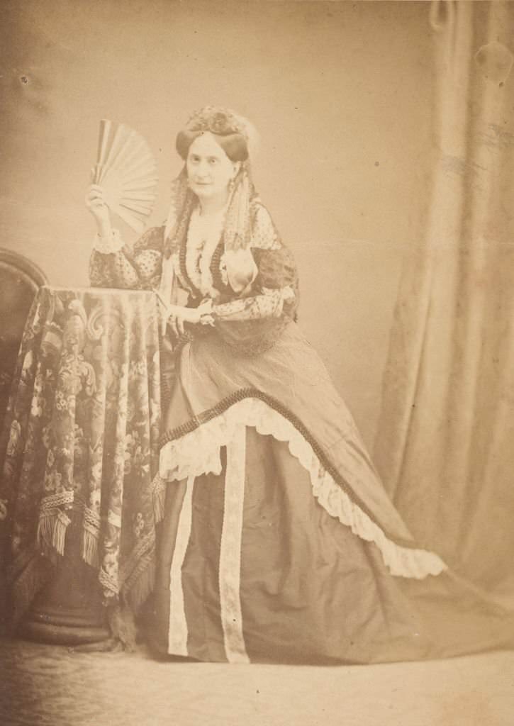 #40 La Comtesse at Table Holding Fan, 1860s